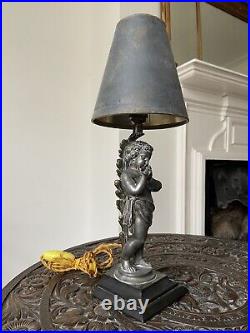 A French early 20th century, silver bronze putti lamp, marble base, 30cm