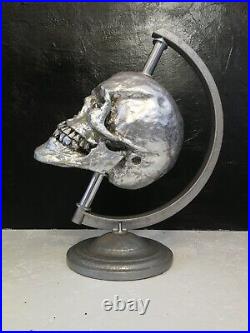Human skull gothic decor ornaments figures art sculpture globe map of the world